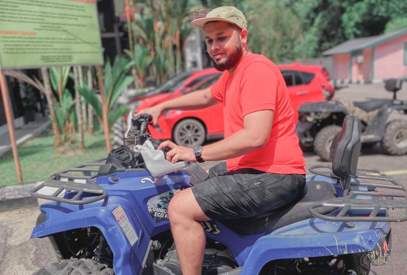 Shyam beaming as he rider the ATV at Resort Taman Eko Rimba Komanwel
